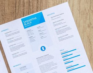 Resume with blue accents on a table